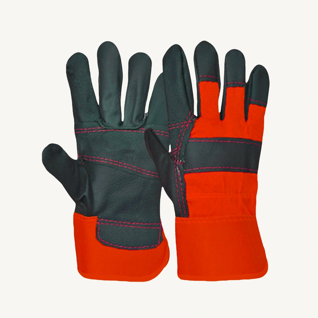 High-visibility red and black Furniture hide grain leather gloves for professional industrial work and mechanics.