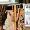 Man measuring hand circumference for glove sizing.