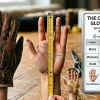 Man measuring hand circumference for glove sizing.